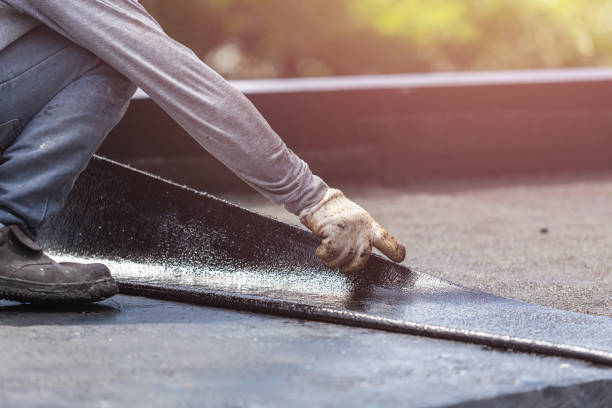 Professional Waterproofing technician working in Brookville, NY